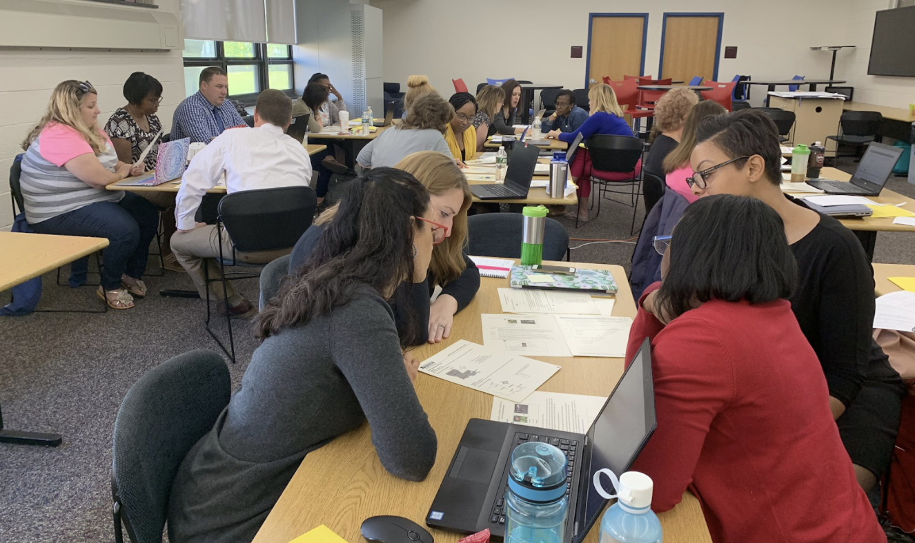 Colonial-professional-development-teachers-working-together